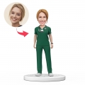 Custom Female Doctor Bobblehead in Green Scrubs with Engraved Text National Doctor's Day Gift