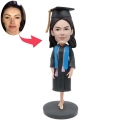 Custom Female Graduation Bobbleheads In Black Gown and Blue Ribbon