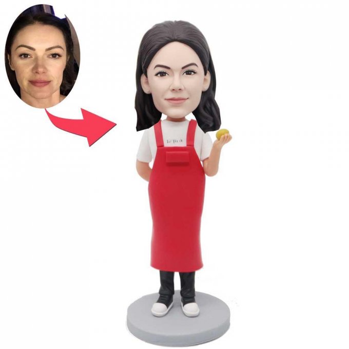 Custom Happy Female Baker Bobbleheads In Red Apron Holding A Pastry