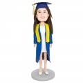 Custom Happy Female Graduation Bobbleheads In Dark Blue Gown And Yellow Ribbon