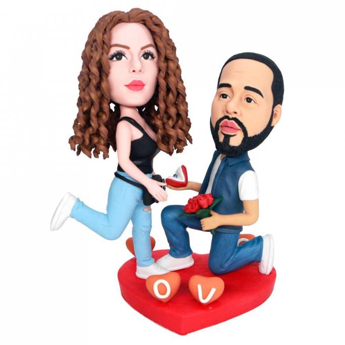 Custom Proposal Couple Bobbleheads Holding Rings And Flowers