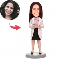 Female Doctor Holding A Needle Custom Bobblehead With Engraved Text